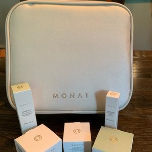 NWT - MONAT Travel Bag and 5 Travel-Size Products